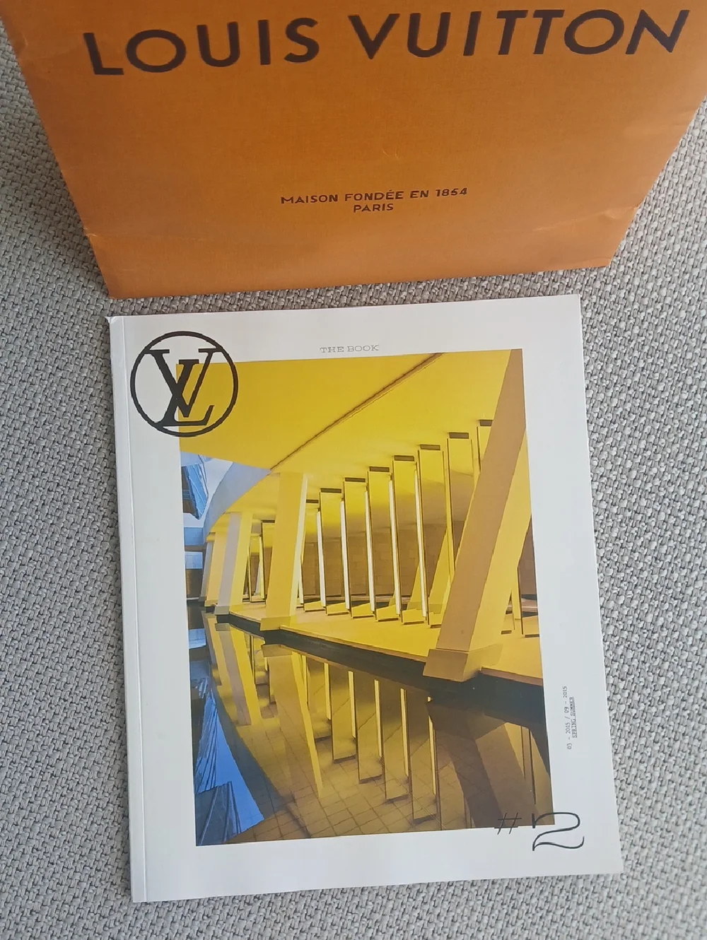 Louis Vuitton Shopping Bag – And Louis Vuitton magazine.